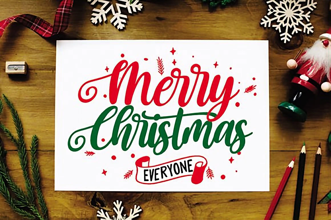 Handwritten Christmas script font showcased with ornaments, pine branches, and modern calligraphy style